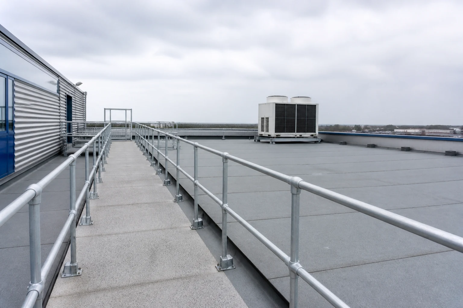 Clear rooftop access route to a commercial condenser